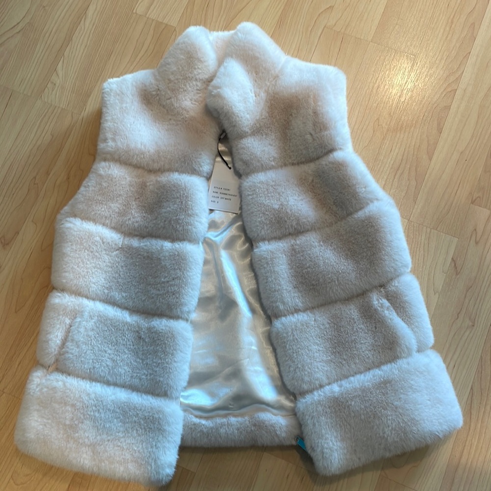 Never worn beautiful off white faux fur vest